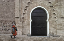 Waterseller near mosque door